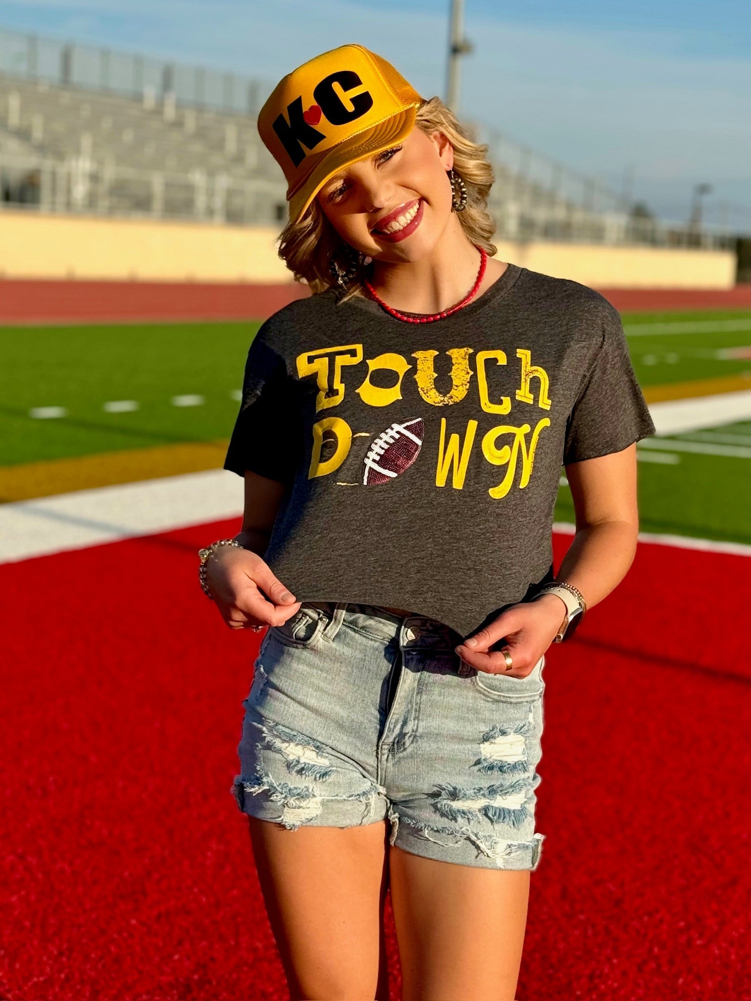 Gold Touchdown with Sequin Football by Randi Mahomes